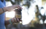 Person holding package of CBD gummies