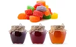 Three Jars of Jam and Pile of Gummy Candies Made with Pocantico Resources Ingredients